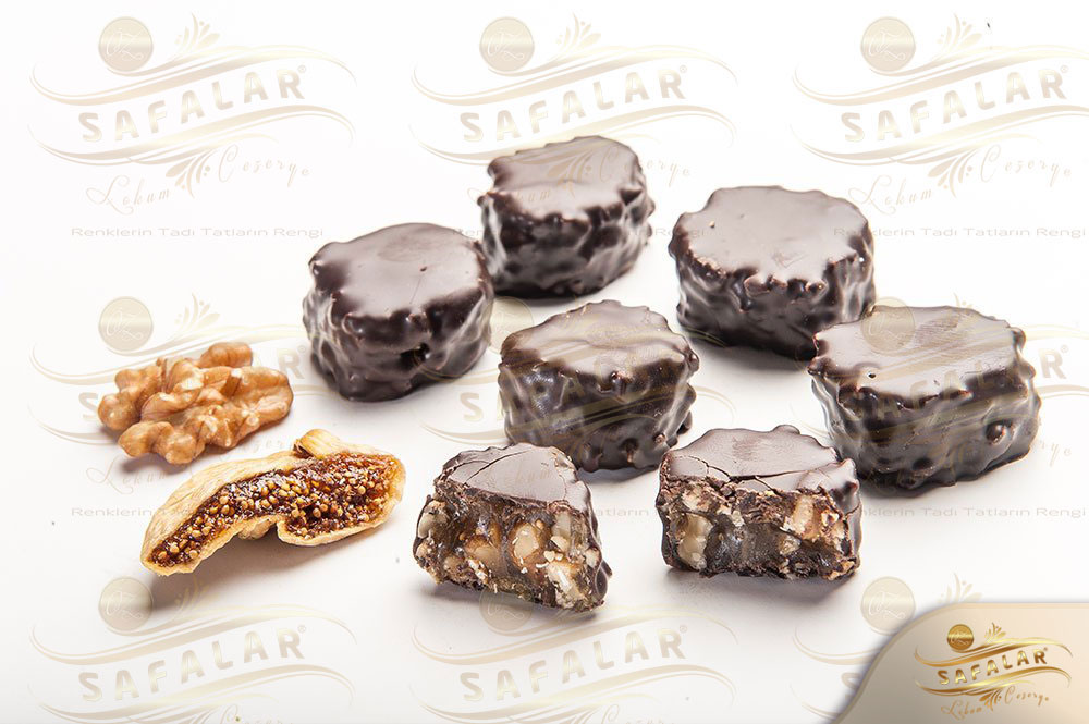 Chocolate Coated Walnut and Fig Turkish Delight | Özsafalar Confectionery | Turkish Delight & Cezerye Since 1982 | Flavored Plain Delights, Spiced Cut Delights, Traditional Delights, Rolled Delights, Chocolate-Covered Delights, Ribbon Delights, Cezerye Varieties, Special Delights, Turkish Delight Sausages, Special Packaged Delights, Traditional Packaged Delights, Custom-Made Delights | Turkish Delight Manufacturer, Wholesale Turkish Delight, Konya Turkish Delight Producer, Konya Turkish Delight Stores, Istanbul Turkish Delight Shops, Gift Box Delight Varieties, Premium Delight and Confectionery Products, Turkish Dessert Culture, Traditional Sweets, Hygienic Delight Production, Modern Delight Factory, Worldwide Turkish Delight Export